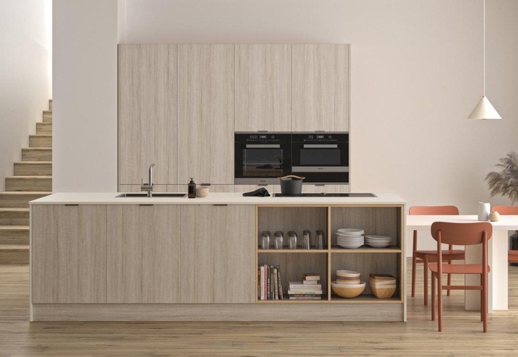 Efficient contemporary kitchen featuring Allure Metro cabinetry in white oak.