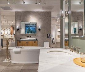 Interior shot of Kohler Hubbard showing a close up of a sink and a bathroom display