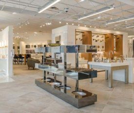 interior shot at kohler palatine of the floor with sinks, faucets, and shower heads