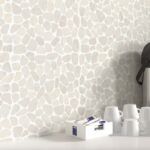 Kitchen with emser cultura in ivory on the wall