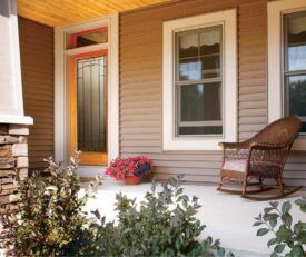 Allure entry door with full length privacy decorative glass in art deco style.