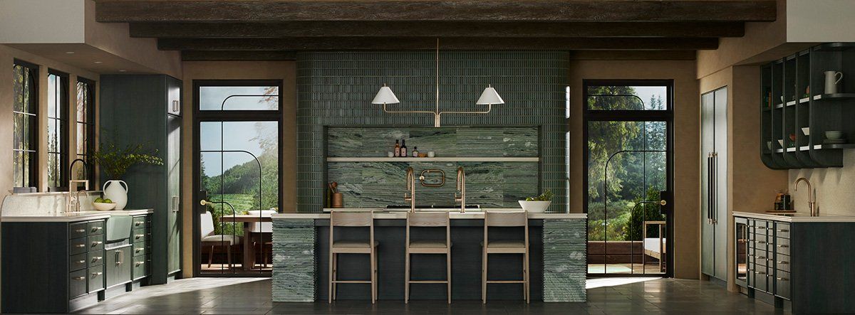 green and gold kitchen feature kohler mcgee fixtures